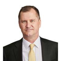 Corporate head shot of AER Board member Justin Oliver