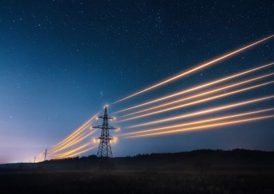 A depiction of electricity running through a transmission tower