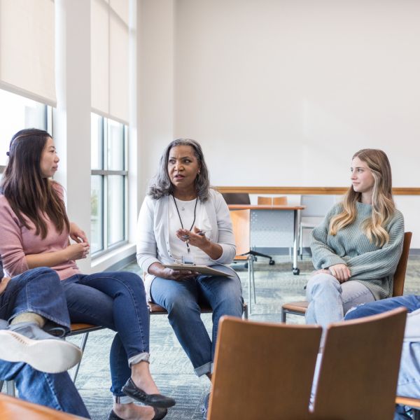 A group of people taking part in a focus group discussion.